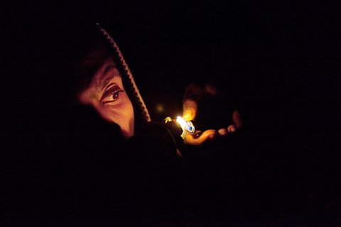 A young man smoking crystal meth. 2012.