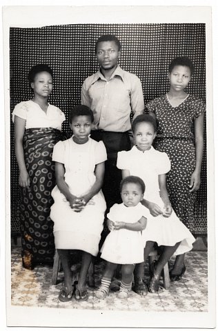Janette Katembera, Quintin Katembera, Chantal, Eméride, Rebecca, Rachelle. From a Katembera family photo album. Photographer unknown. Goma, D.R.C., c. 1983.