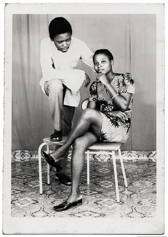 Lema and friend. Photograph by Lema Mpeve Mervil of Studio Photo Less. Kinshasa, D.R.C., c. 1975.
