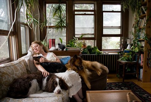 Polly Vollmar-Heywood of the West Bank neighborhood in Minneapolis, Minnesota, is a horticultural therapist and the owner of four rescue dogs. July 2008.
