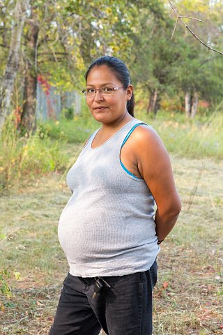 Regina Rushman, 28, an Ojibwe and member of the Red Lake Nation in northern Minnesota is a farm laborer with the Red Lake Local Food Initiative. The Initiative is part of a plan to feed the approximately 5,000 tribal members with organic produce grown on the reservation. <br>September 2017.