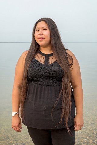 Veronica Bratvold, 31, stands at the edge of Red Lake on the Red Lake Indian Reservation in northern Minnesota. <br>September 2017.