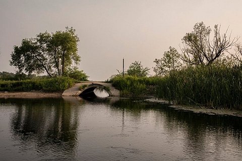 A small bridge marks the passage between two popular fishing lakes in northern Minnesota. Though Minnesota is known as the "land of 10,000 lakes," there are actually 11,842 lakes in the state. 